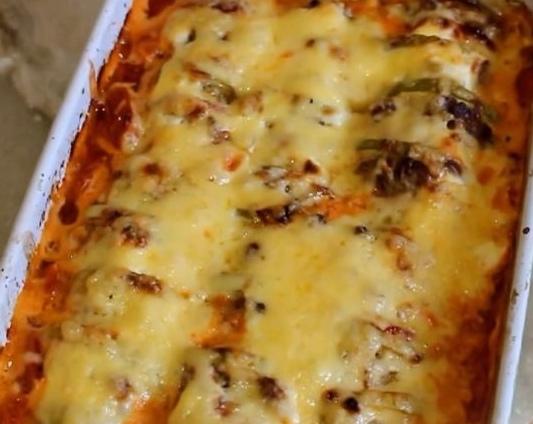 Кабачки, запеченные в духовке, с фаршем и рисом